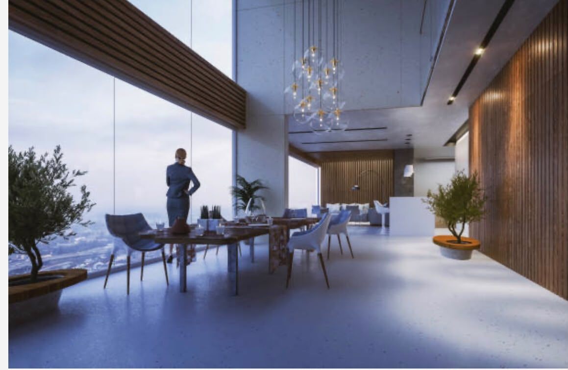Salone con grandi vetrate affacciate sul panorama